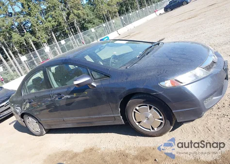 2010 Honda Civic Hybrid z USA, uszkodzony, nr VIN JHMFA3F23AS003464